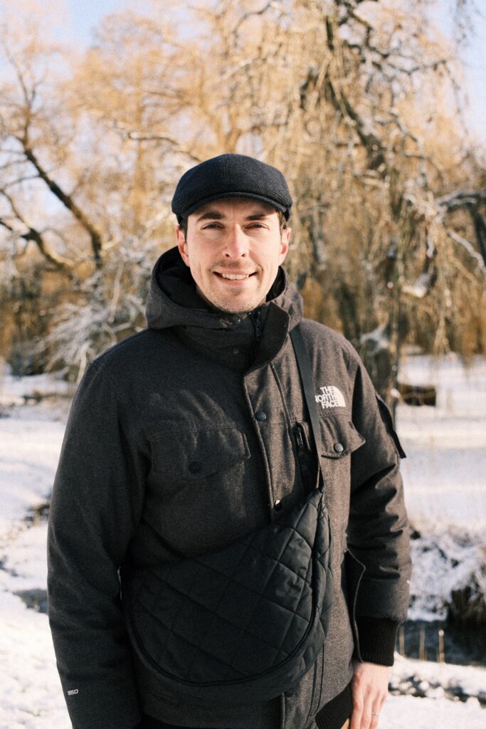 Jérôme Vanbaelinghem outdoors in a green park in Lille, France